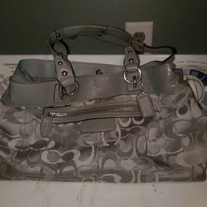 Silver and purple coach purse